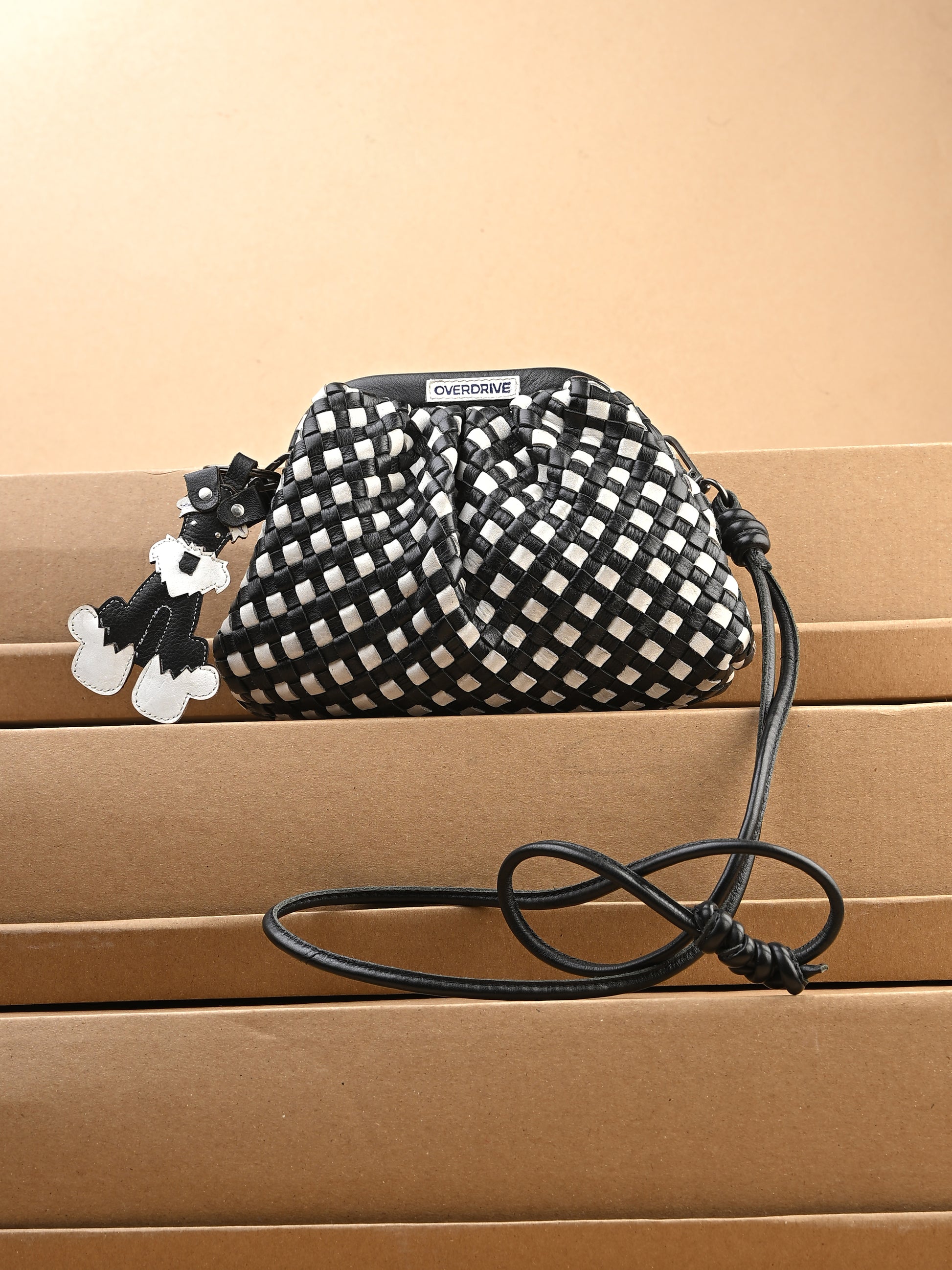 Noir Weave Back & White Leather Sling Bag