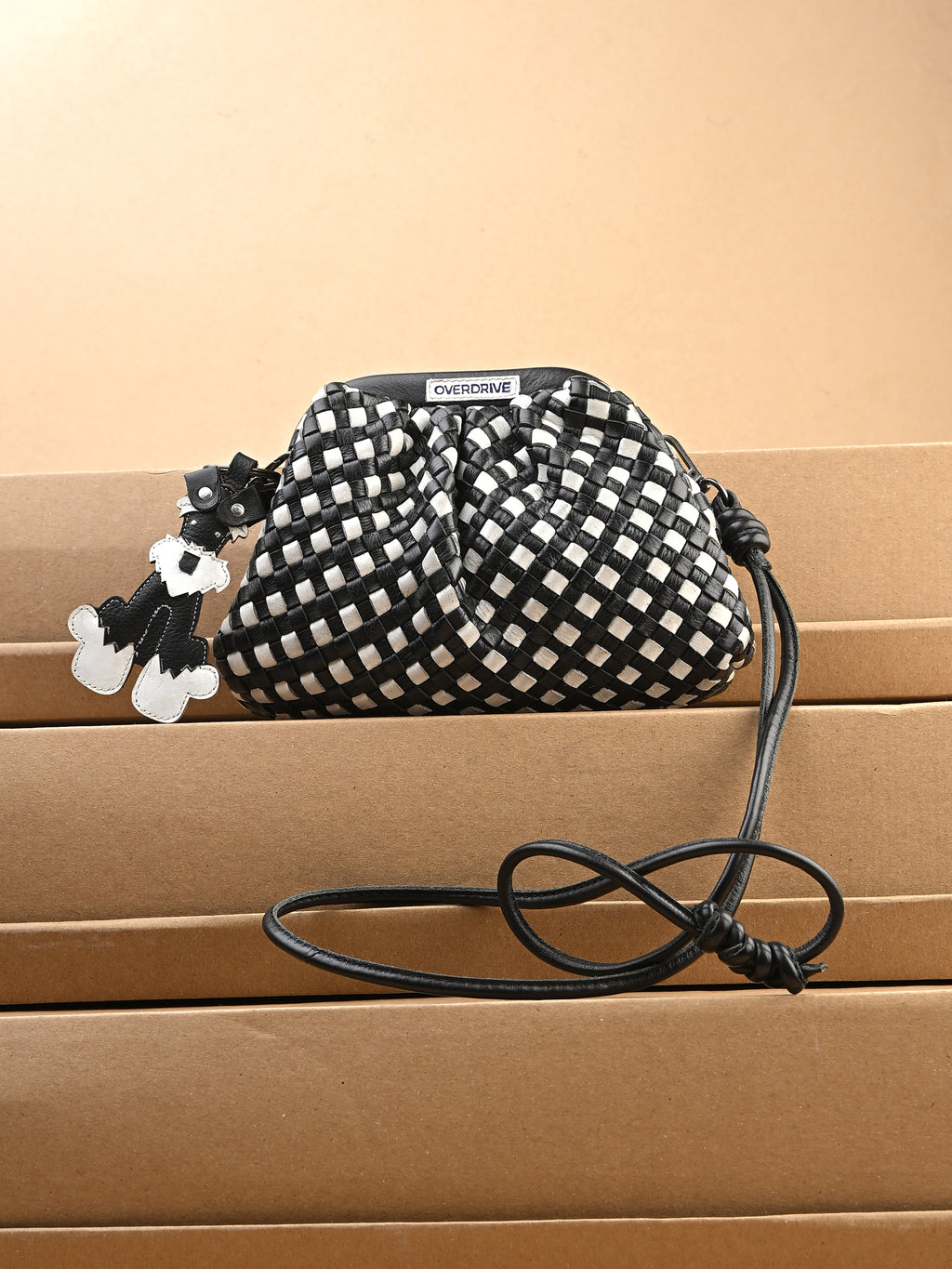 Noir Weave Back & White Leather Sling Bag
